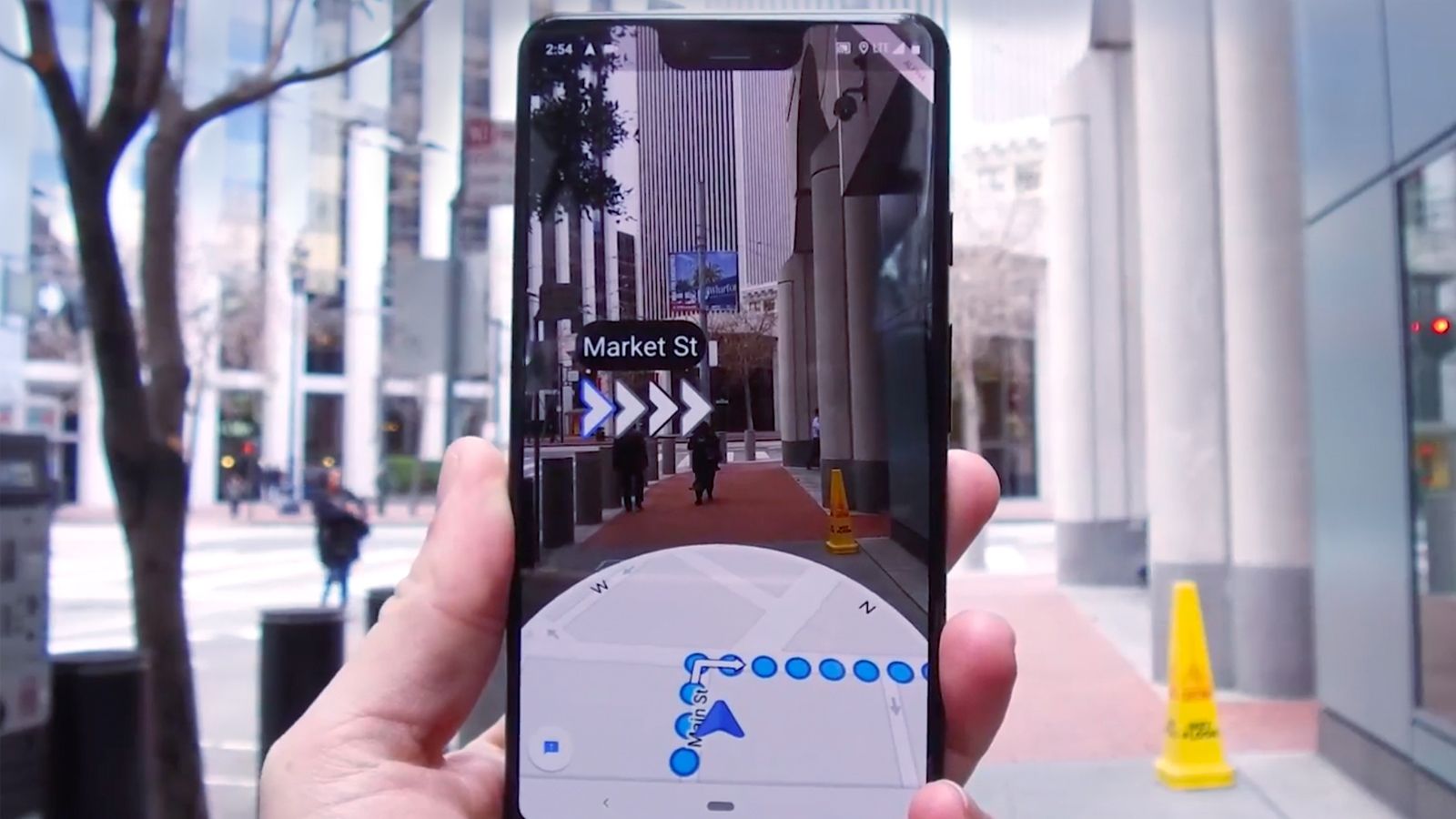 image shows a person looking into his mobile device, mobile screen showing the way to his destination using AR, use of augmented reality and virtual reality in banking